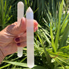 Selenite for massage in the shape of a stick, pencil, mushroom