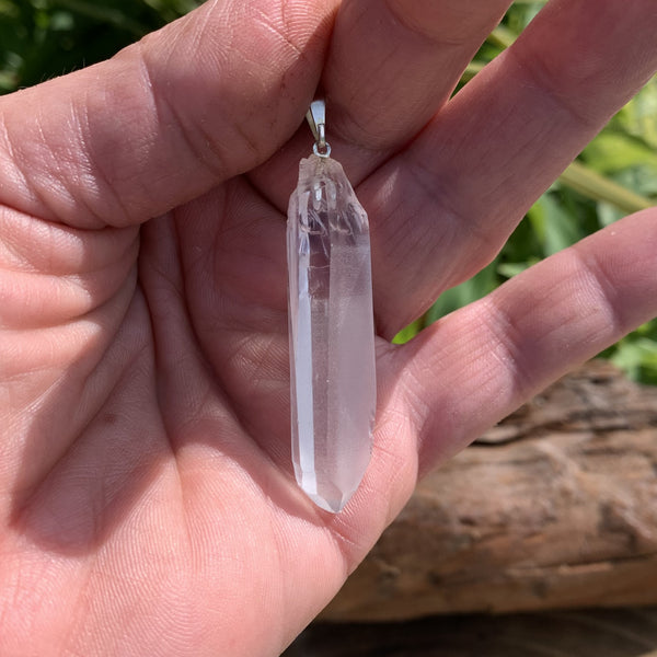 Lemurian quartz pendant with laser point, the "master crystal"