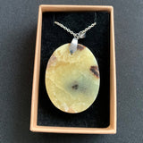 Pendant in septaria and yellow calcite