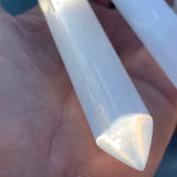 Selenite for massage in the shape of a stick, pencil, mushroom